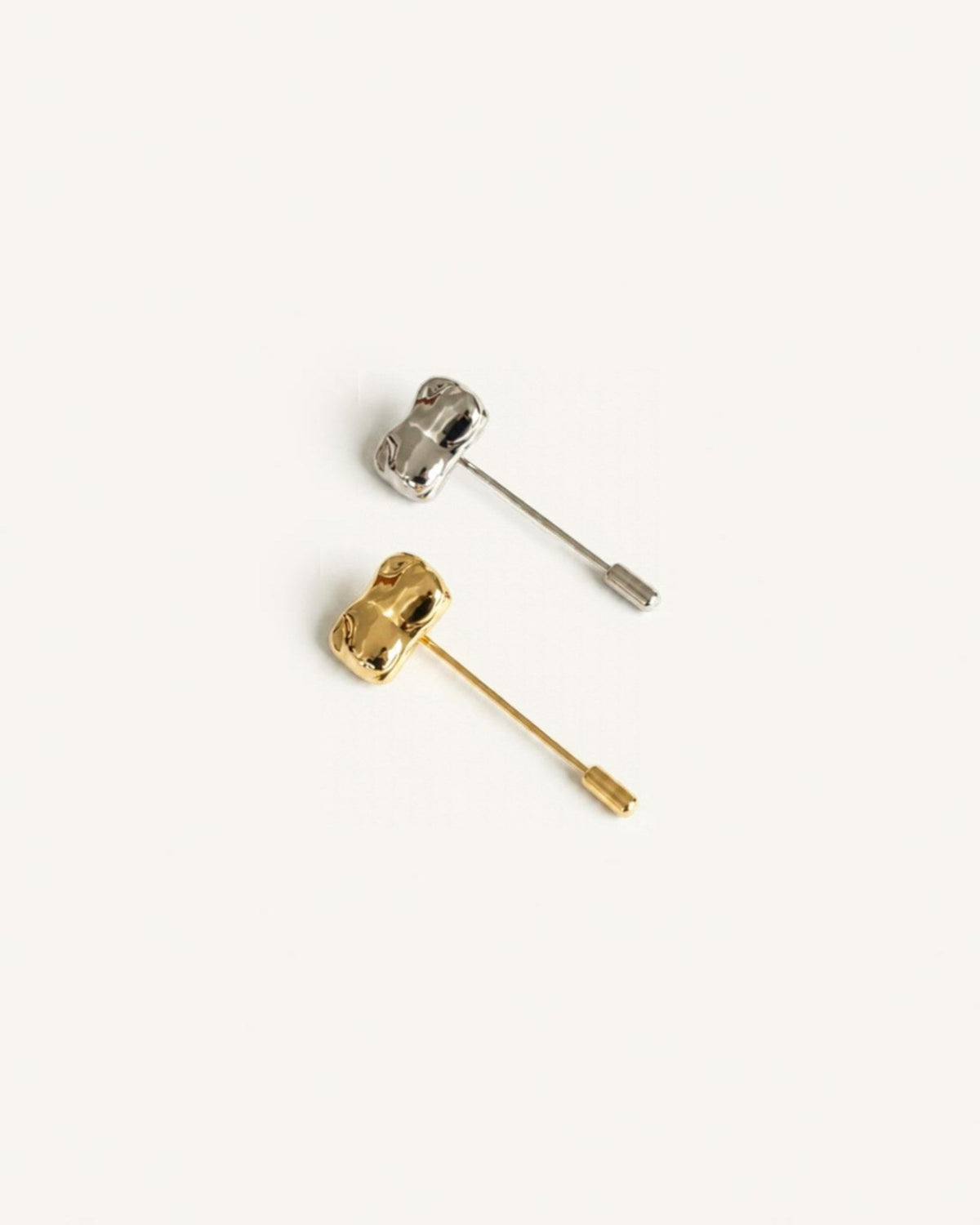The Candace gold-plated sculpted bust jacket pin by House of Rednam