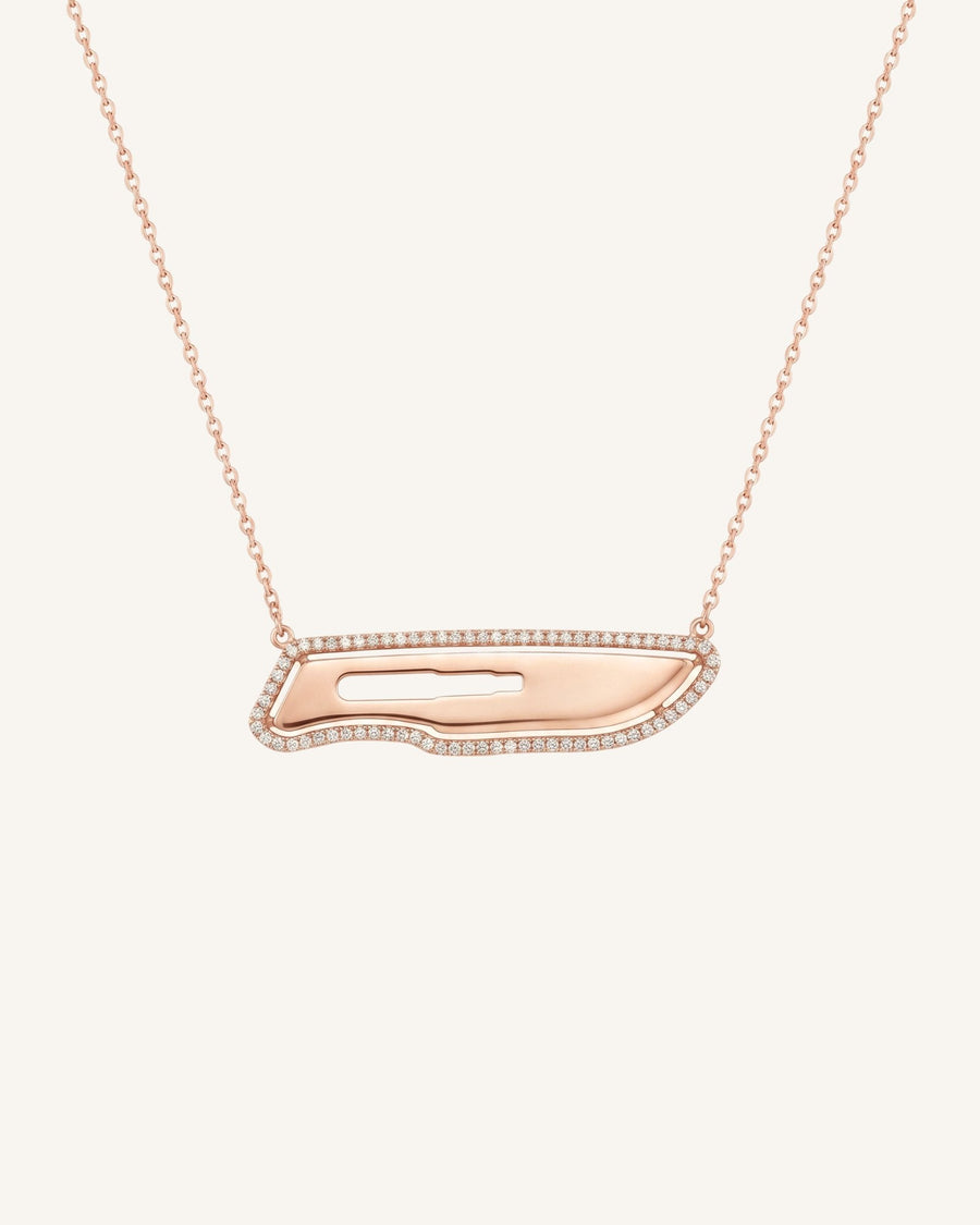 The Kiran 18K gold scalpel necklace with diamond halo by House of Rednam