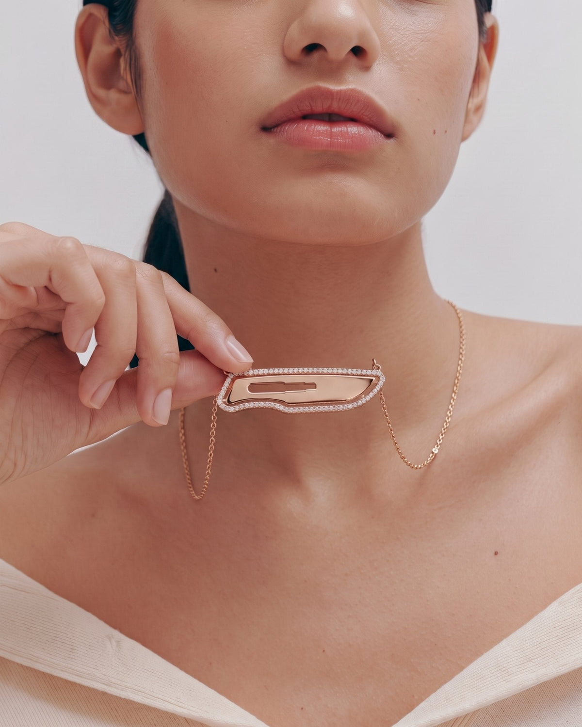 The Kiran 18K gold scalpel necklace with diamond halo by House of Rednam