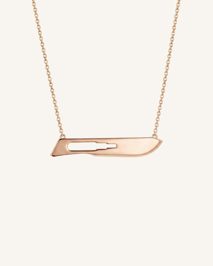 The Kiran No10 scalpel necklace in 18K rose gold by House of Rednam