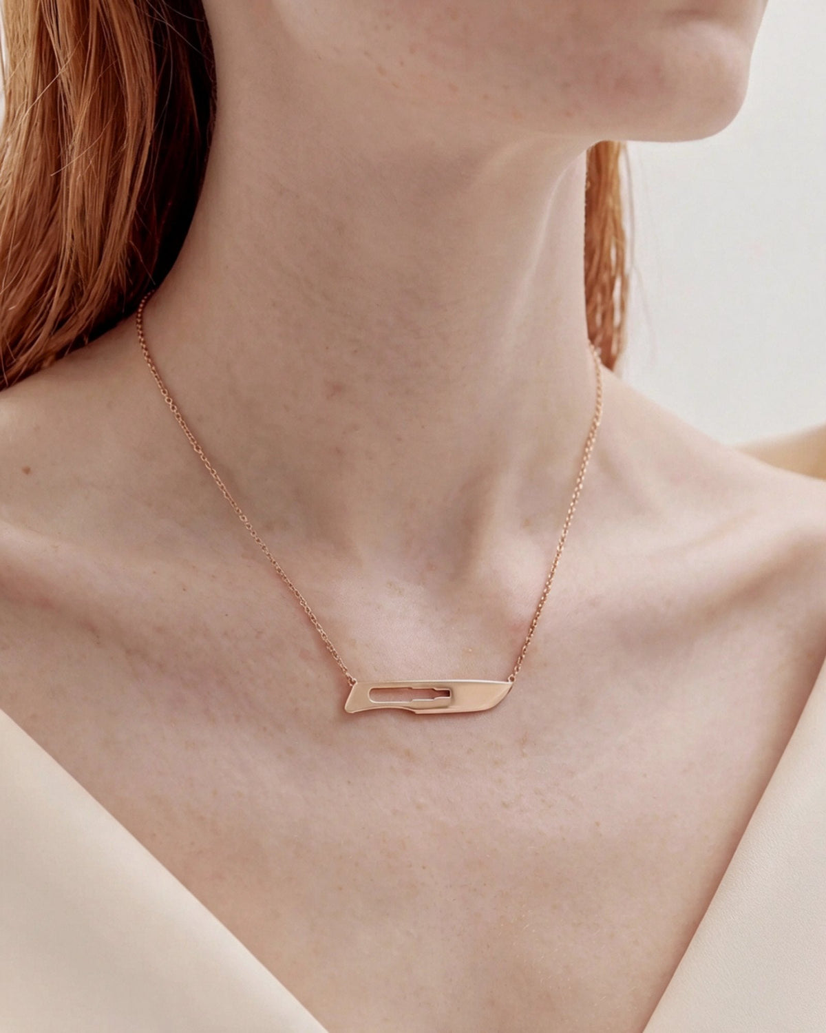 The Kiran No10 scalpel necklace in 18K rose gold by House of Rednam, view 2