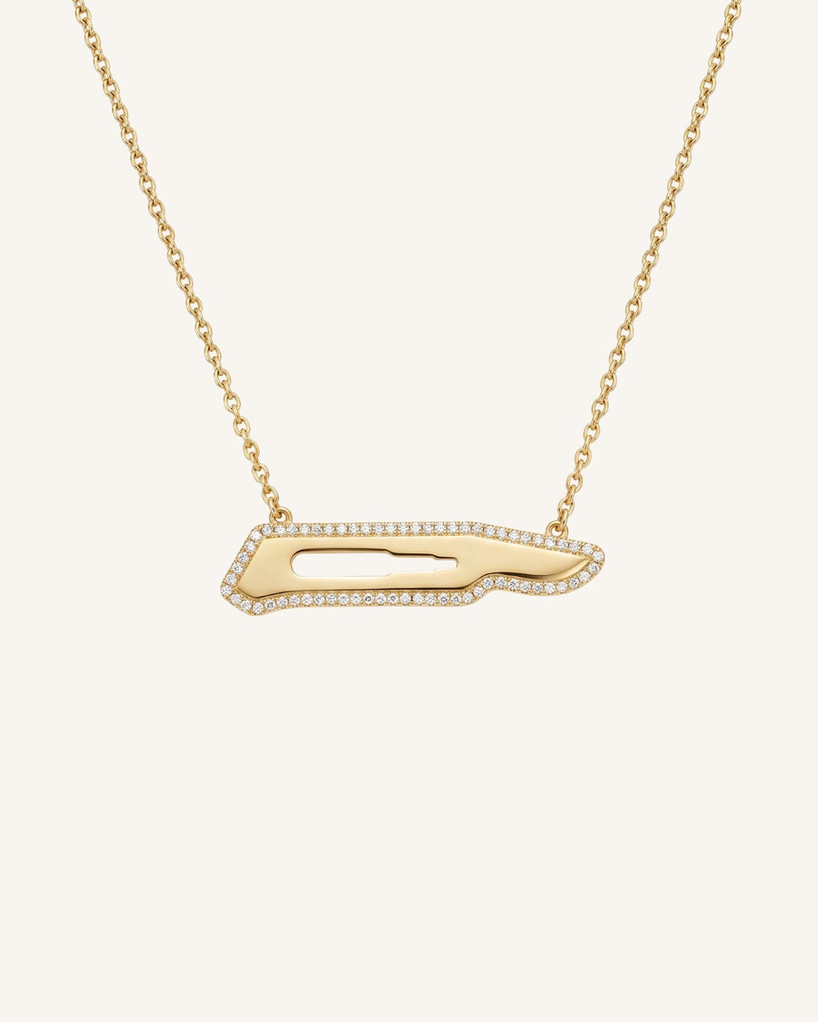 The Kiran 18K gold scalpel necklace with diamond halo by House of Rednam