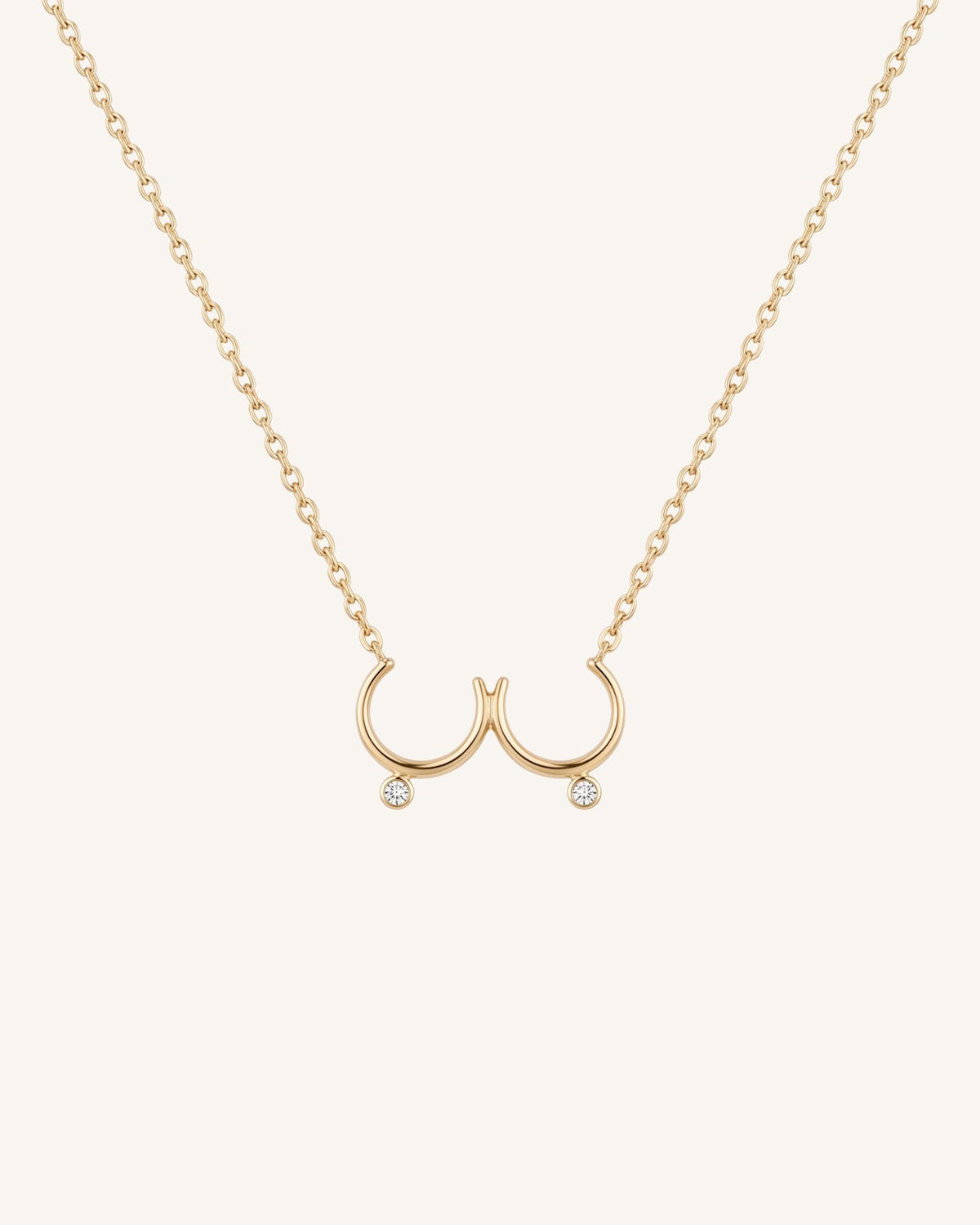 The Priya 18K gold sculpted breast necklace with diamonds by House of Rednam