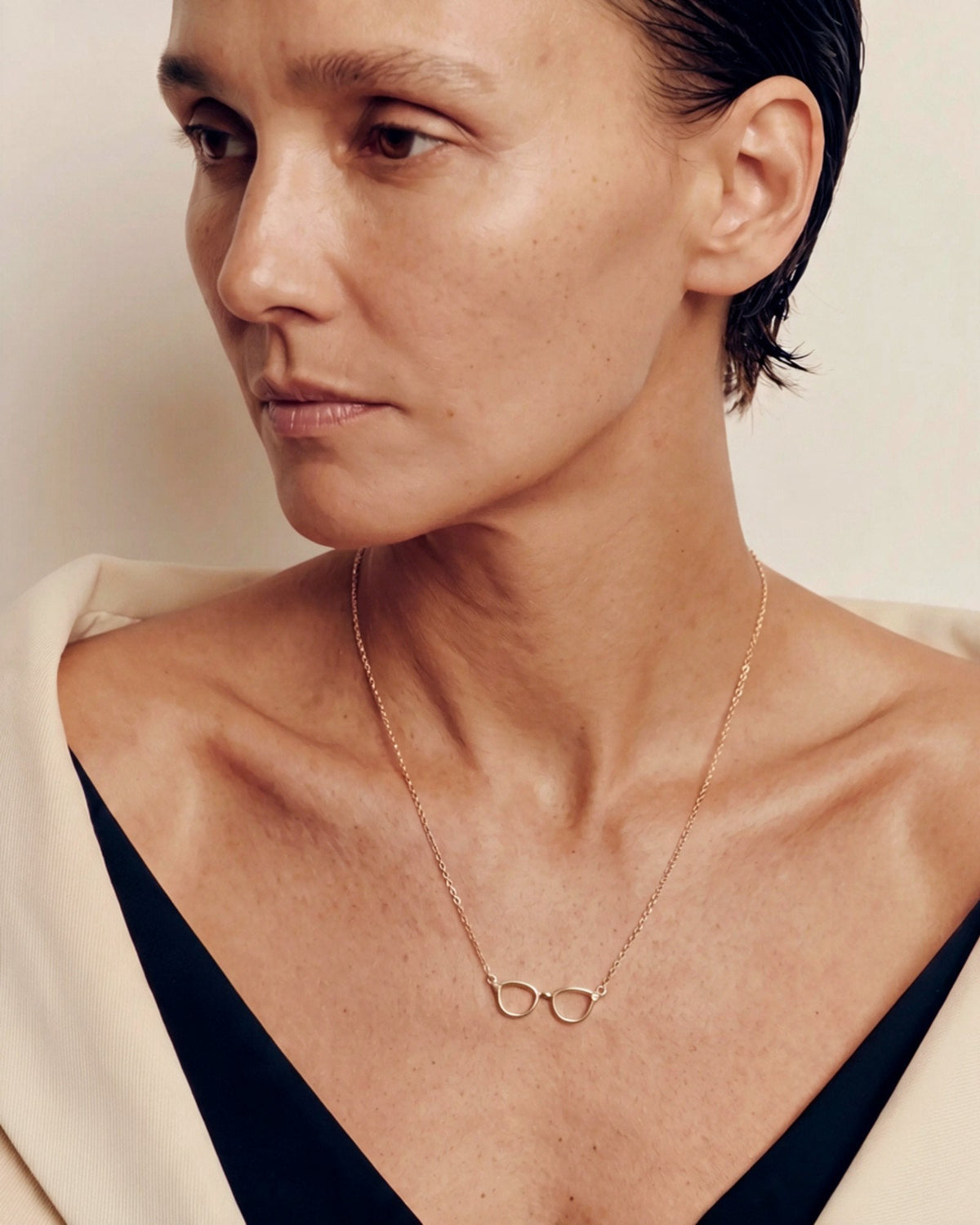 The Choti 18K gold glasses necklace with a diamond by House of Rednam