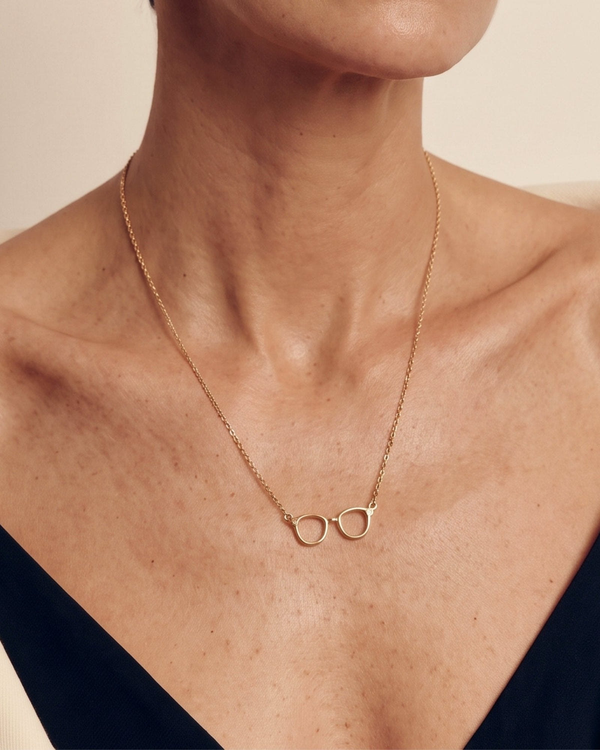 The Choti 18K gold glasses necklace with a diamond by House of Rednam