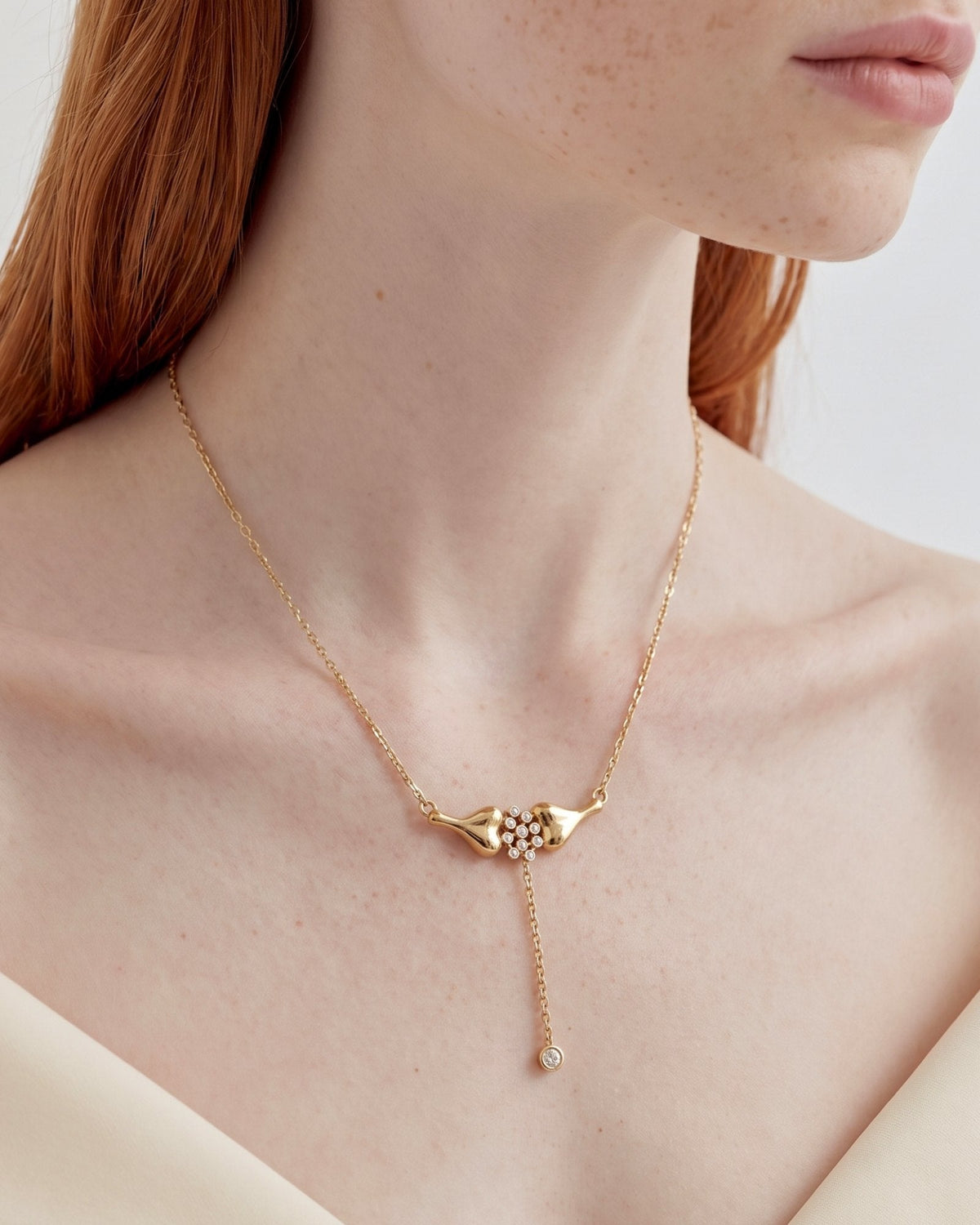 The Ethan 18K gold neuron necklace with diamond synapses by House of Rednam