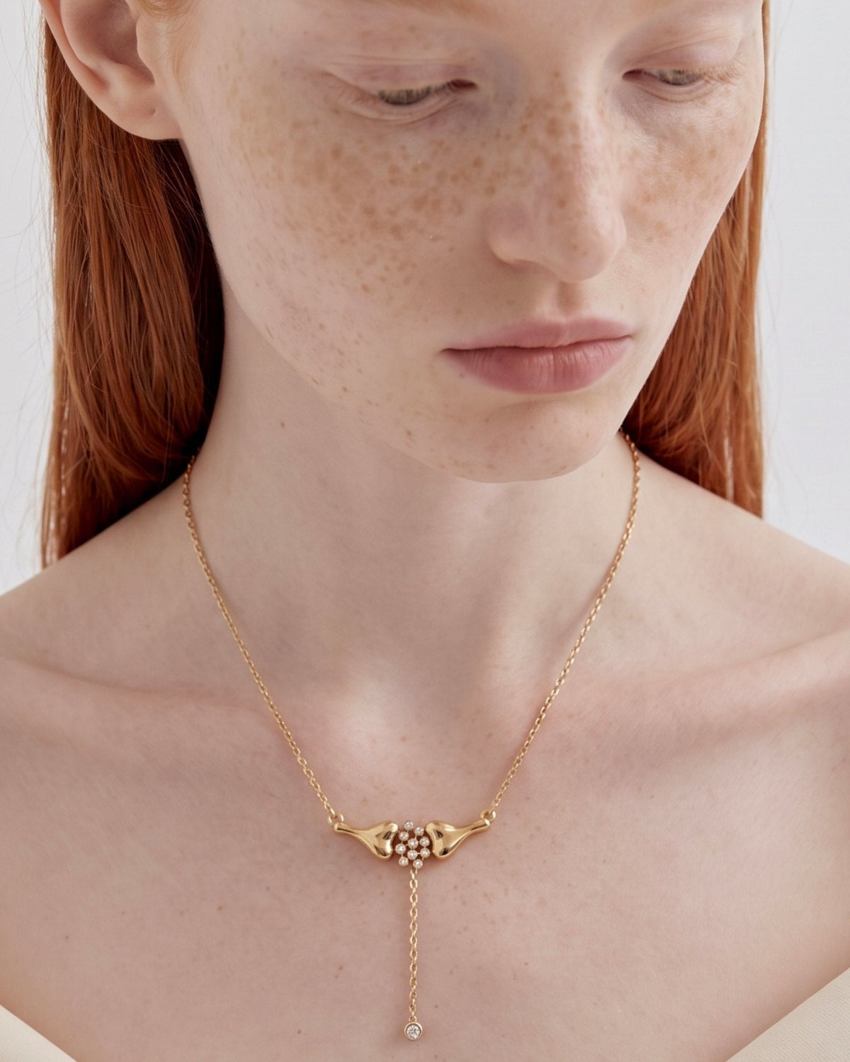 The Ethan 18K gold neuron necklace with diamond synapses by House of Rednam