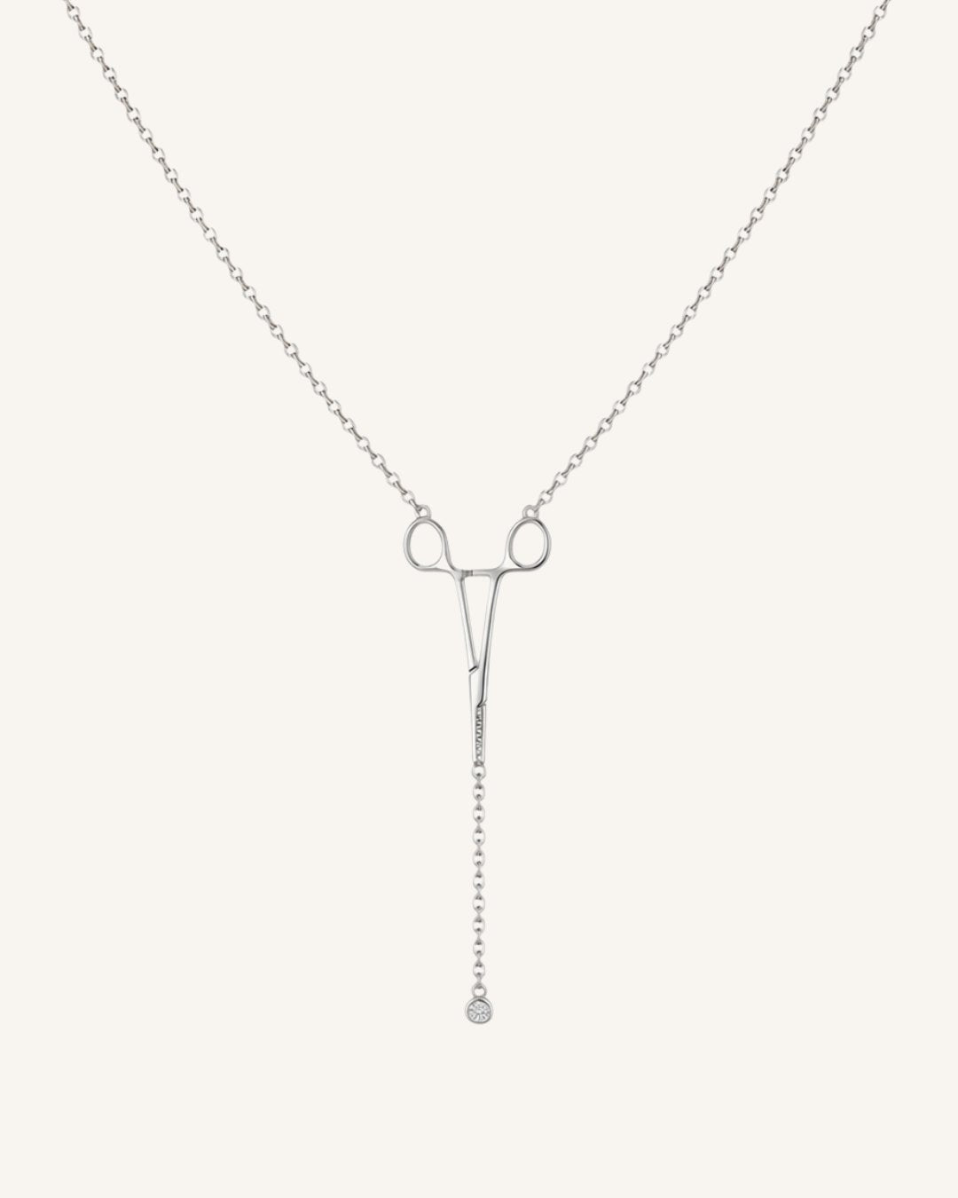 The Erin sterling silver hemostat necklace with a diamond at the hinge by House of Rednam