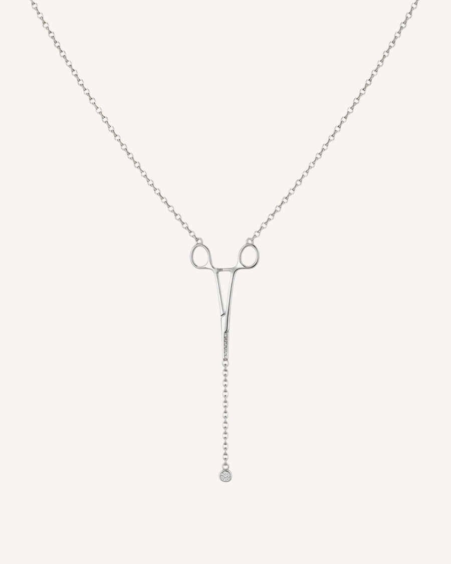 The Erin sterling silver hemostat necklace with a diamond at the hinge by House of Rednam