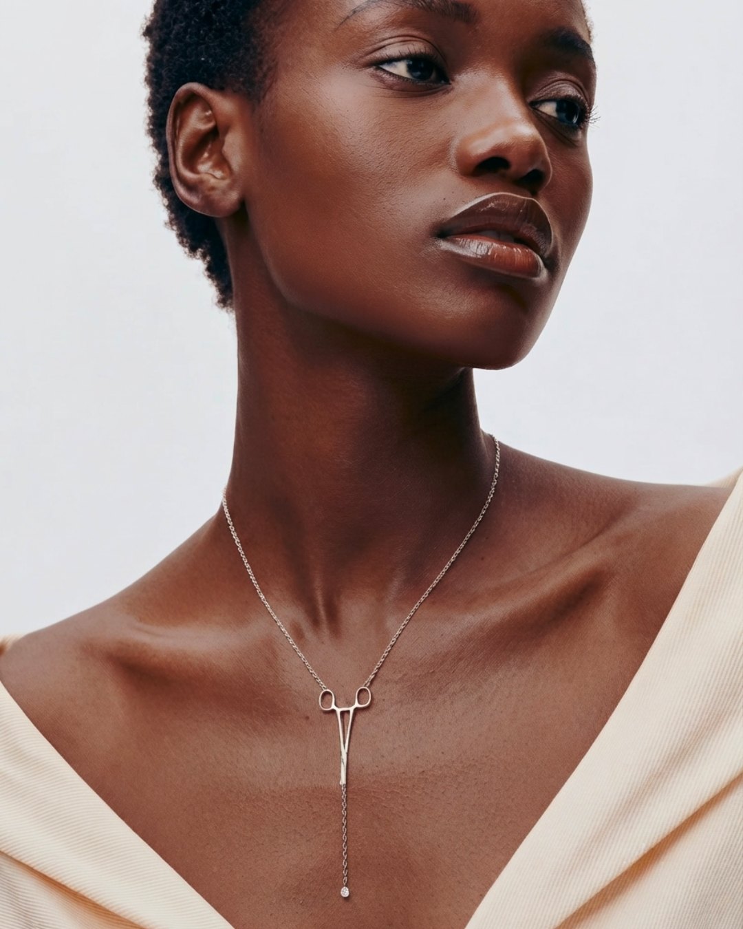 The Erin sterling silver hemostat necklace with a diamond at the hinge by House of Rednam