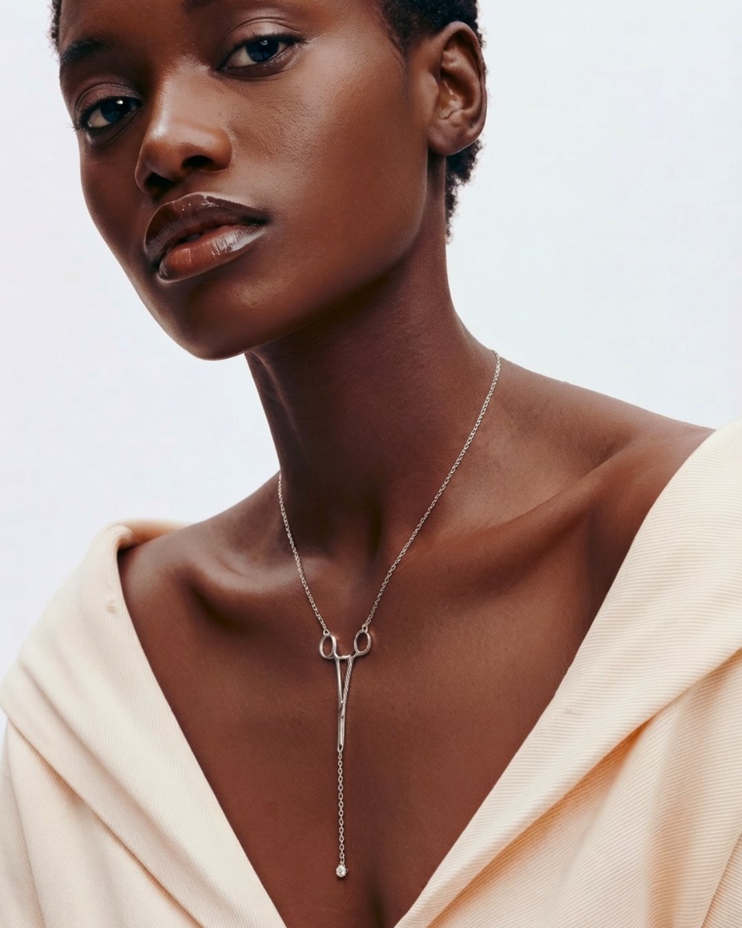 The Erin sterling silver hemostat necklace with a diamond at the hinge by House of Rednam