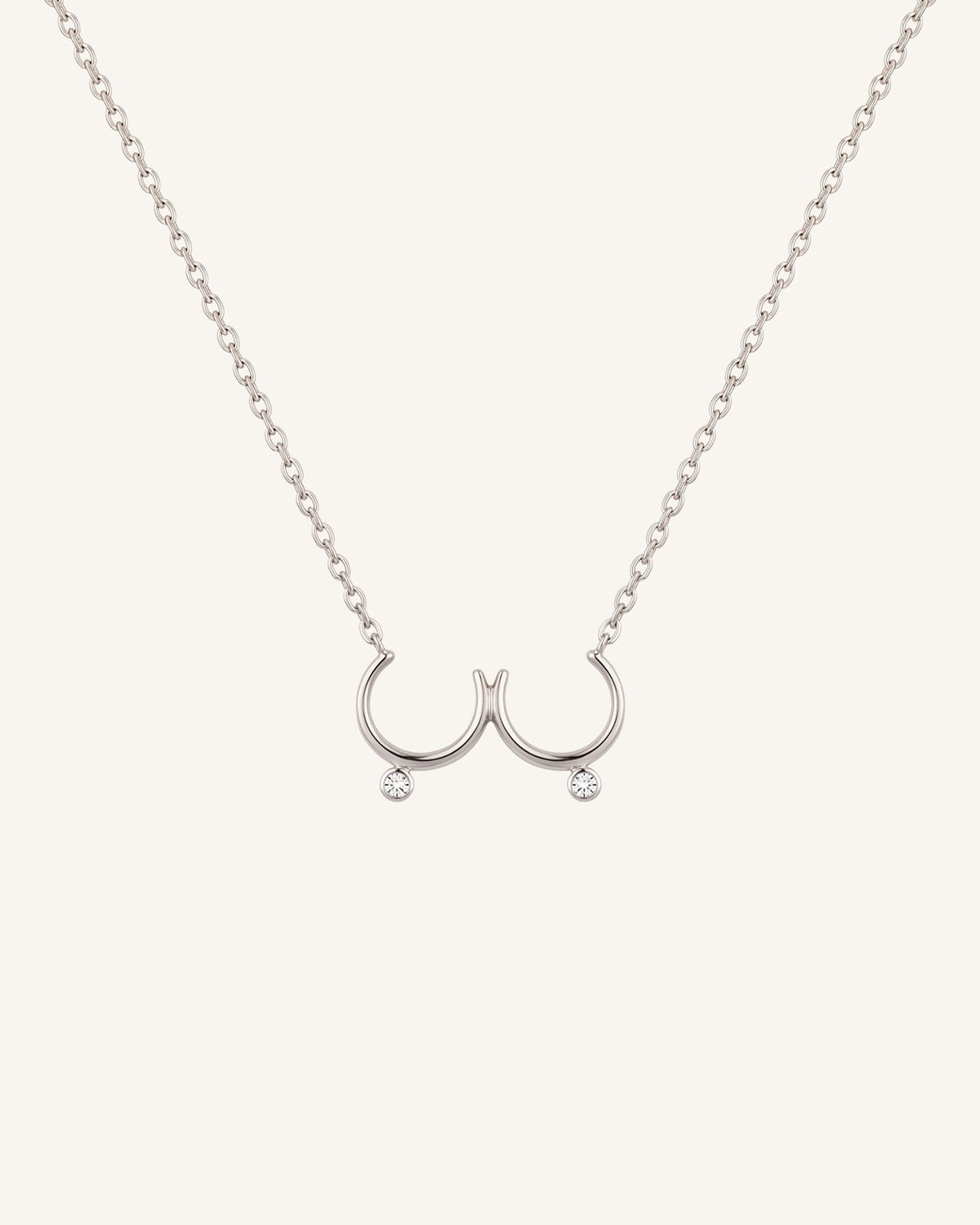 The Priya sterling silver sculpted breast necklace with diamonds by House of Rednam
