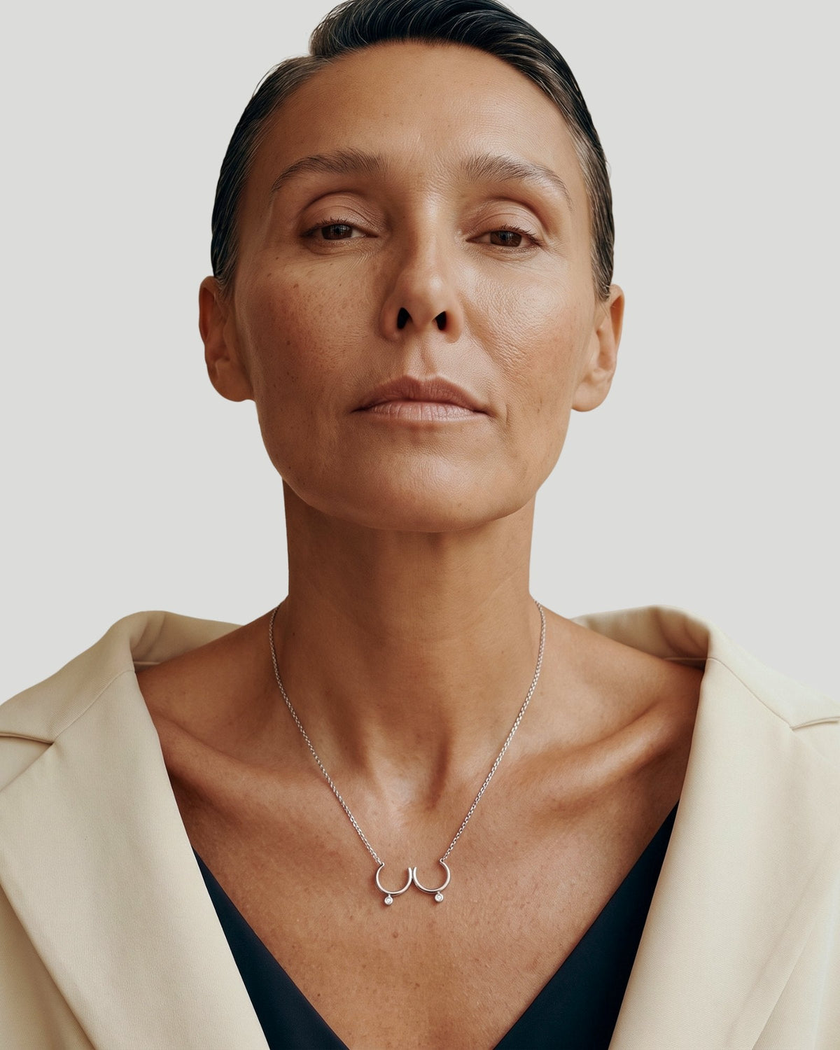 The Priya sterling silver sculpted breast necklace with diamonds by House of Rednam