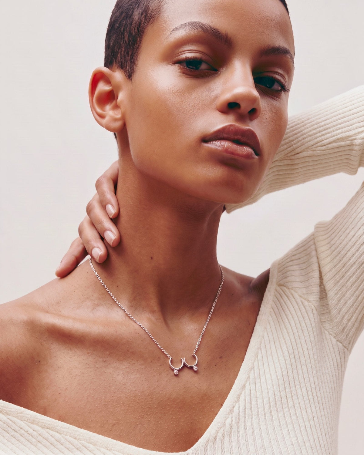 The Priya sterling silver sculpted breast necklace with Pink Sapphires by House of Rednam