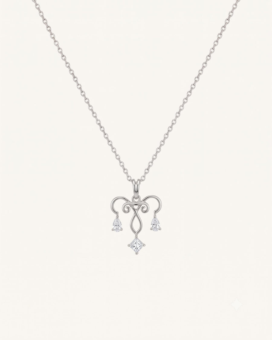 The Chandra sterling silver uterus necklace with diamond ovarian detail by House of Rednam