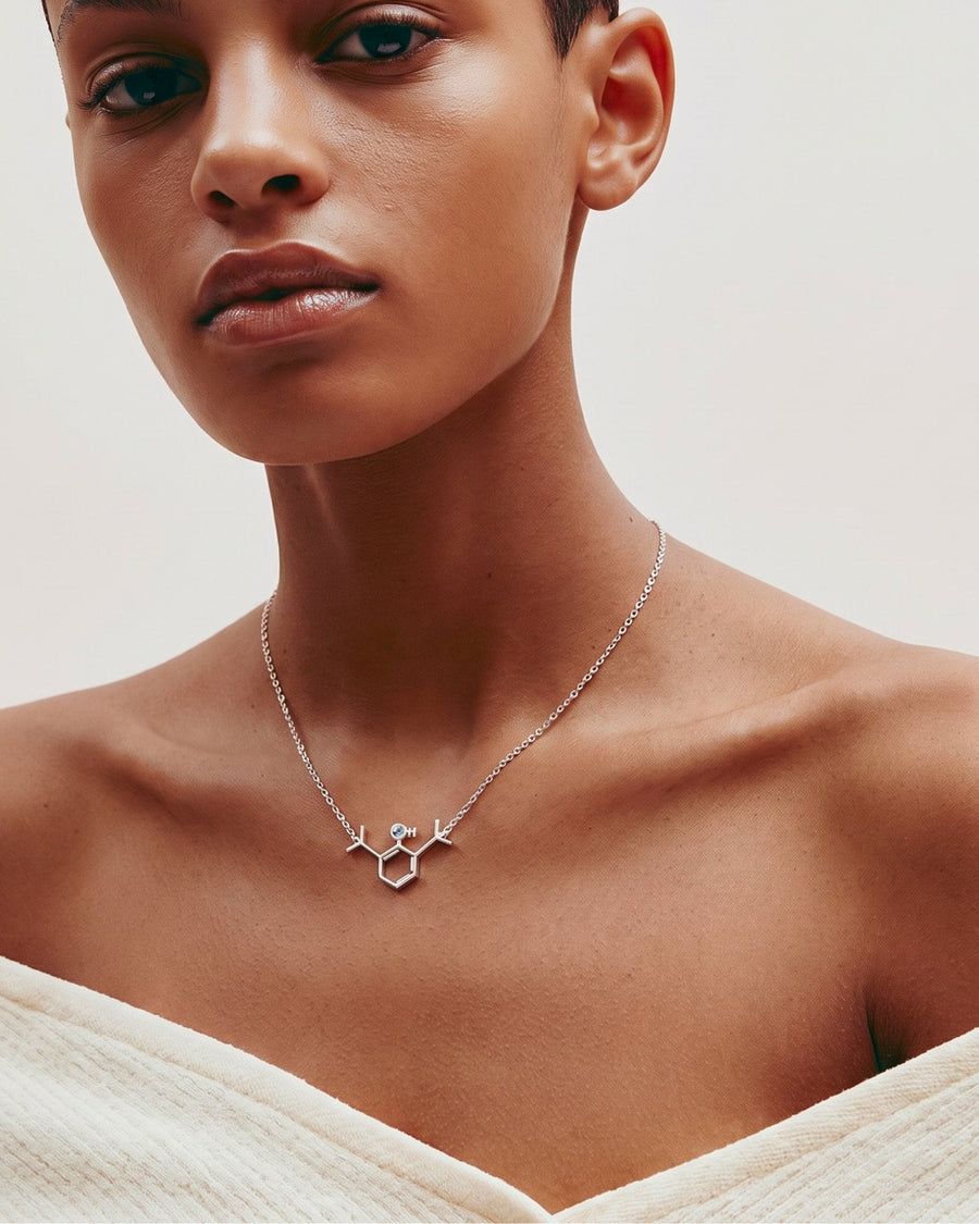 The Johanna sterling silver propofol molecule necklace with blue topaz by House of Rednam